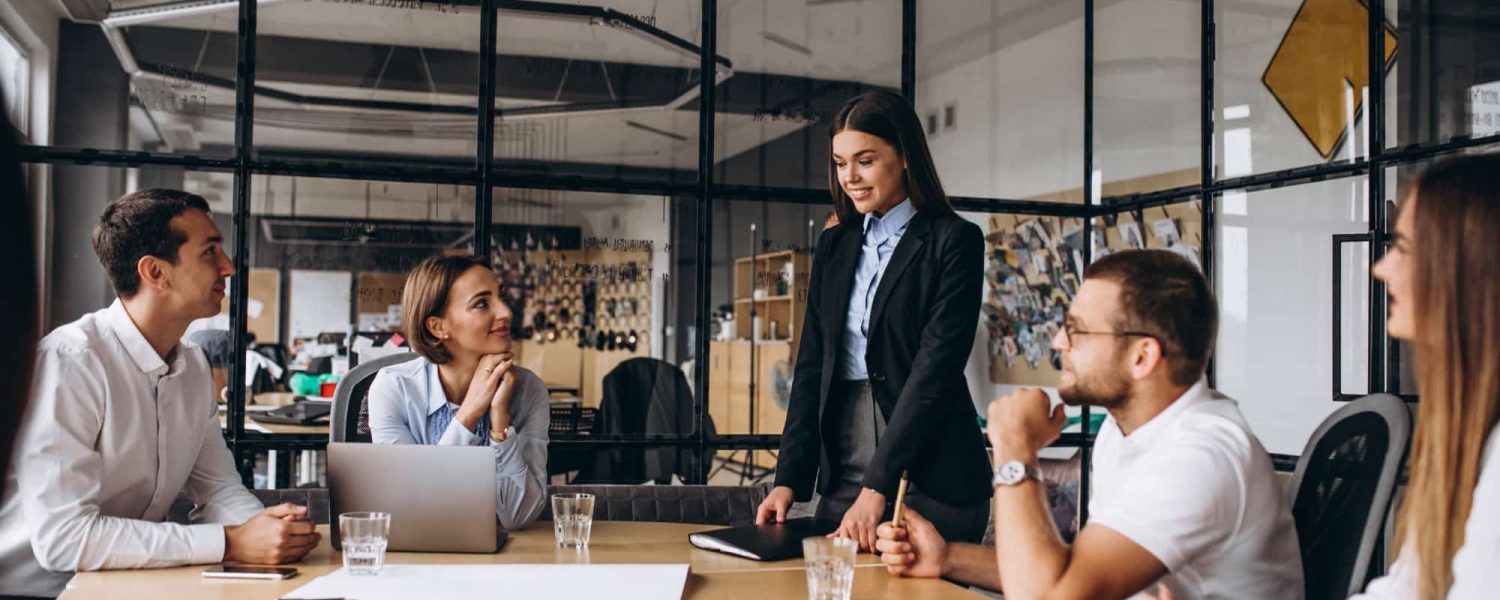 group-people-working-out-business-plan-office